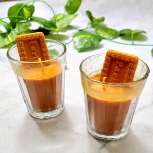 Handmade Chai Biscuit Candle in glass cup with realistic biscuit-shaped wax topper
