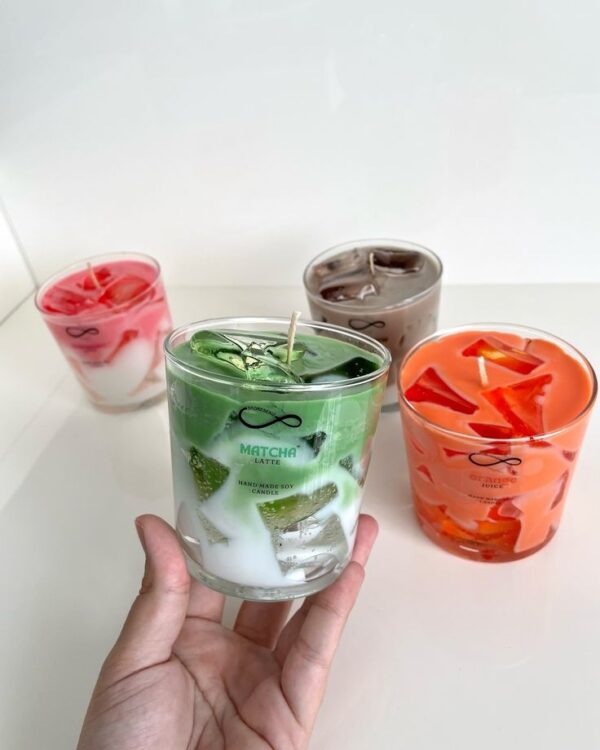 Realistic Iced Latte Candle in clear glass with wax ice cubes and layered coffee milk design