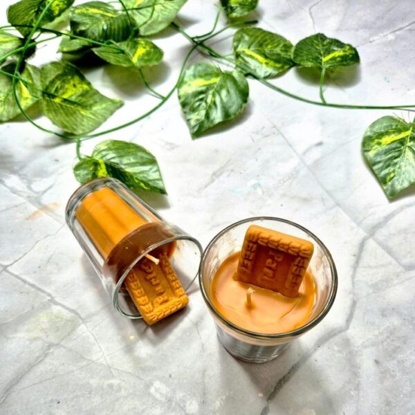 Handmade Chai Biscuit Candle in glass cup with realistic biscuit-shaped wax topper