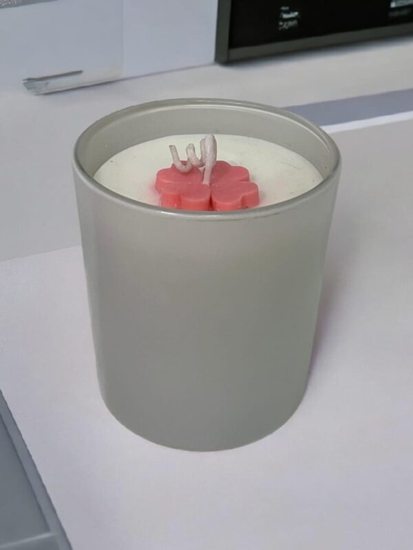 Glossy white scented jar candle with floral wax top by Aesthetic Flames