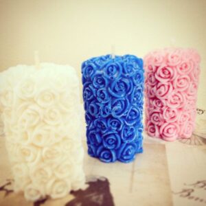 Handmade Rose Pillar Candles crafted from eco-friendly soy wax, featuring detailed rose patterns — perfect for décor, celebrations, and gifting.